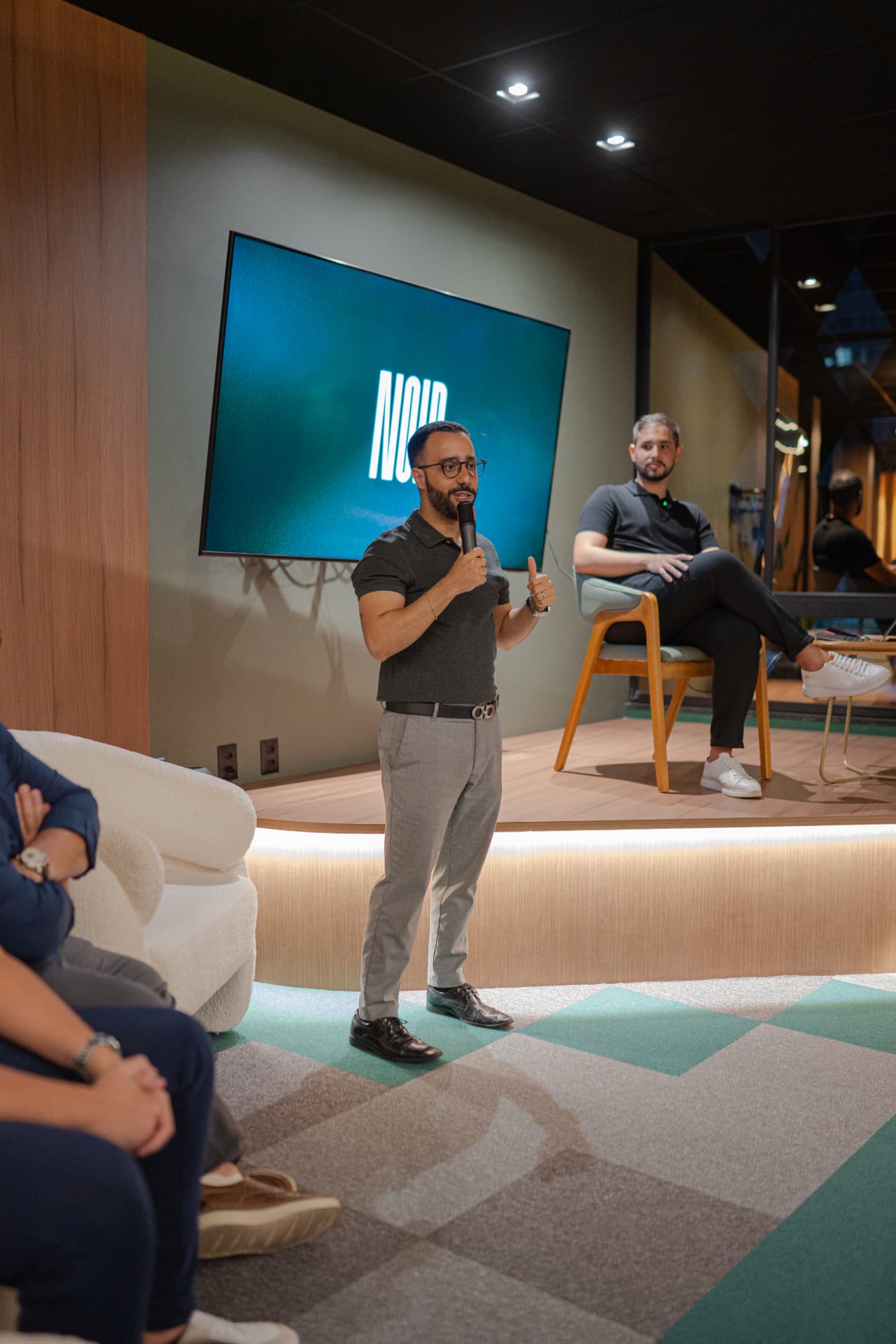 NOIR founder presenting to clients