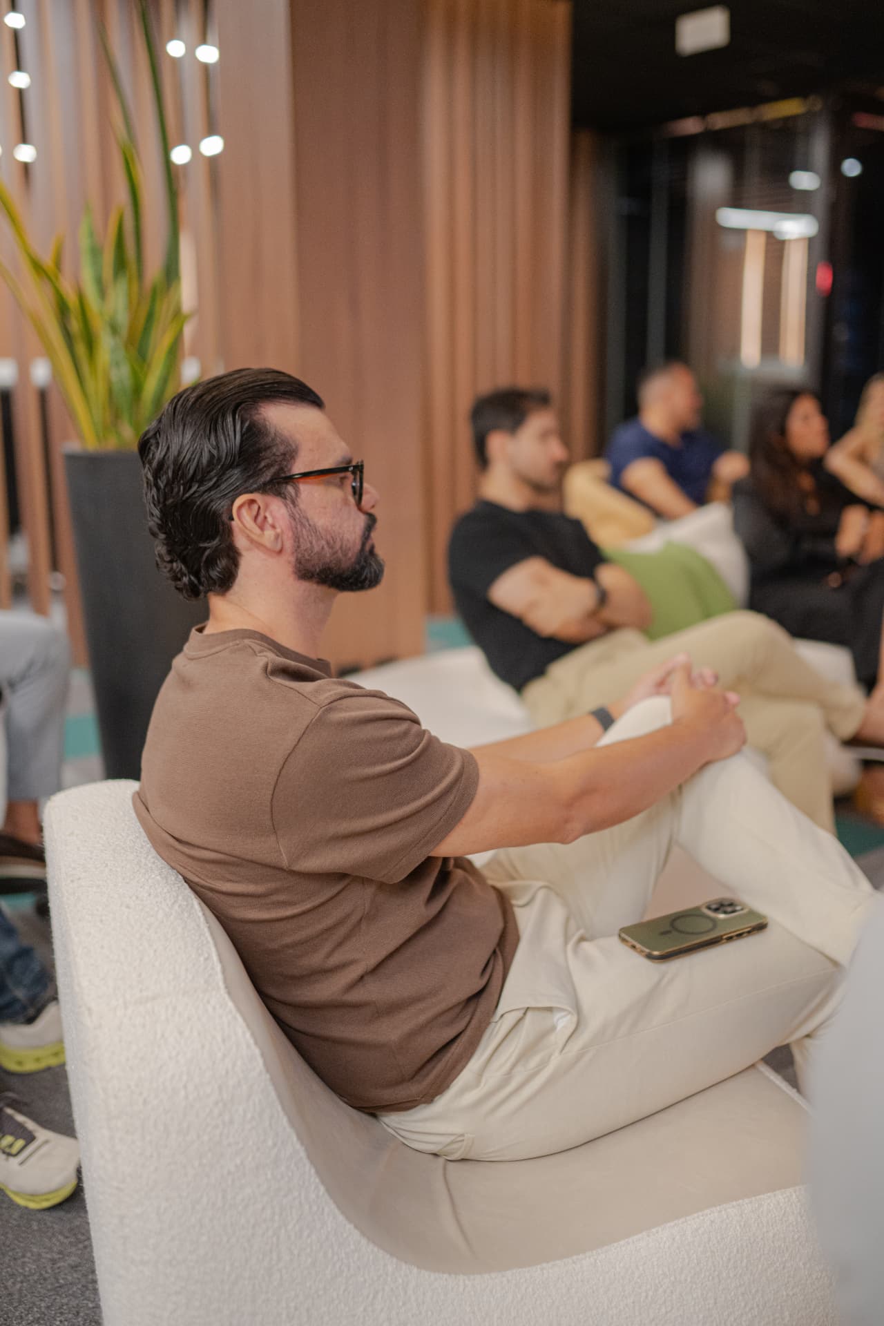 Guests watching a NOIR presentation